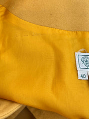 Wool collarless long coat in mustard yellow