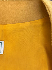 Wool collarless long coat in mustard yellow