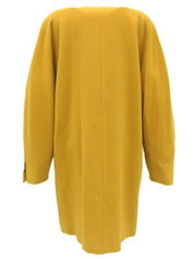 Wool collarless long coat in mustard yellow