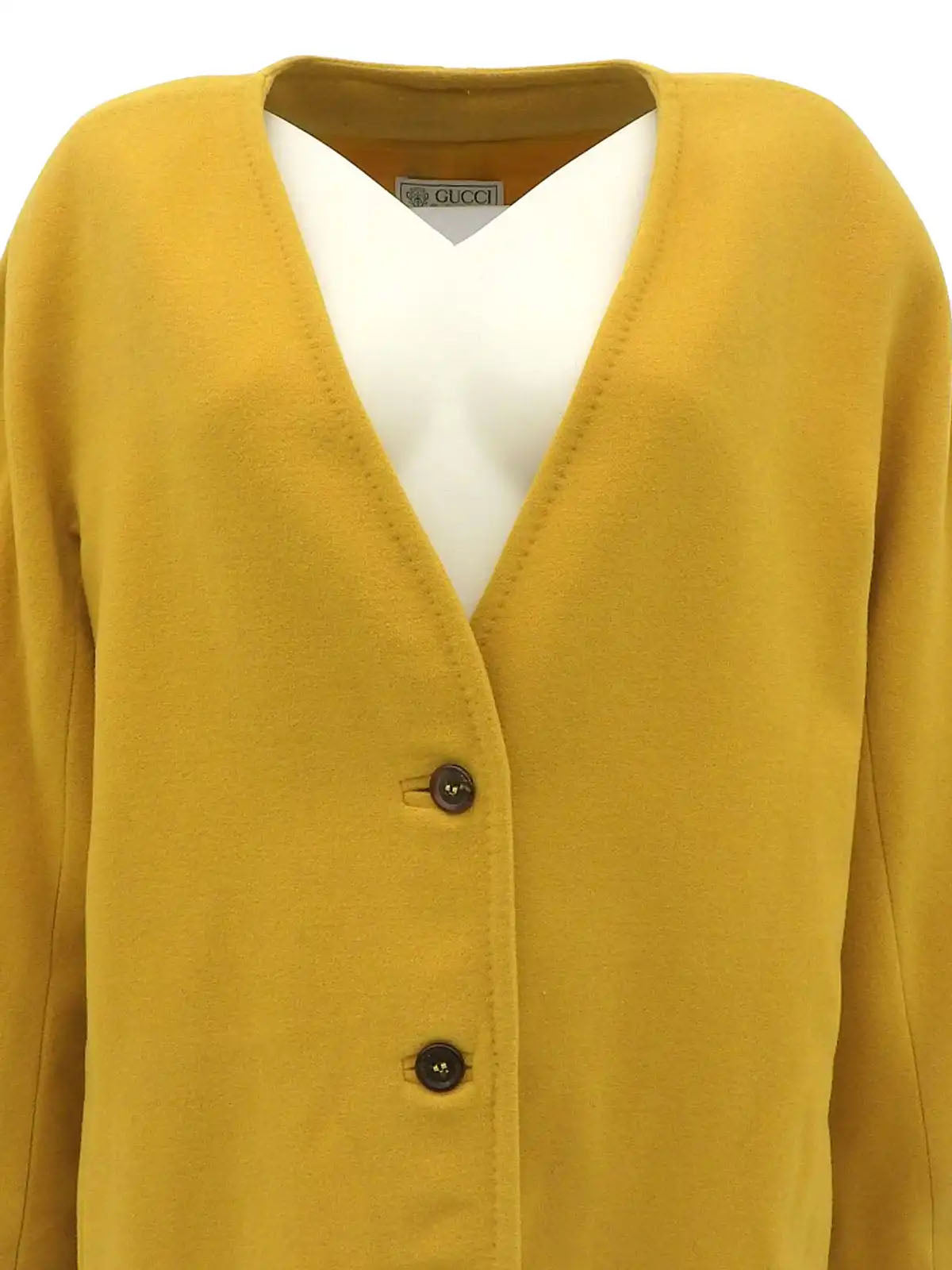 Wool collarless long coat in mustard yellow
