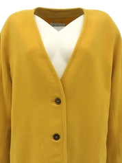 Wool collarless long coat in mustard yellow