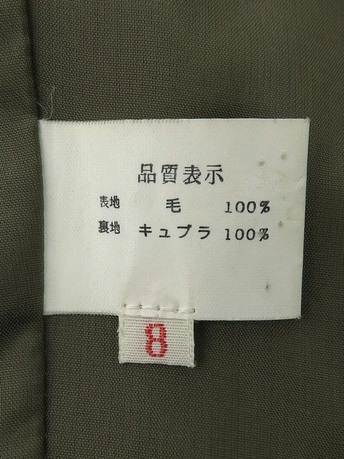 米色、棕色和白色粗花呢千鸟格纹大衣