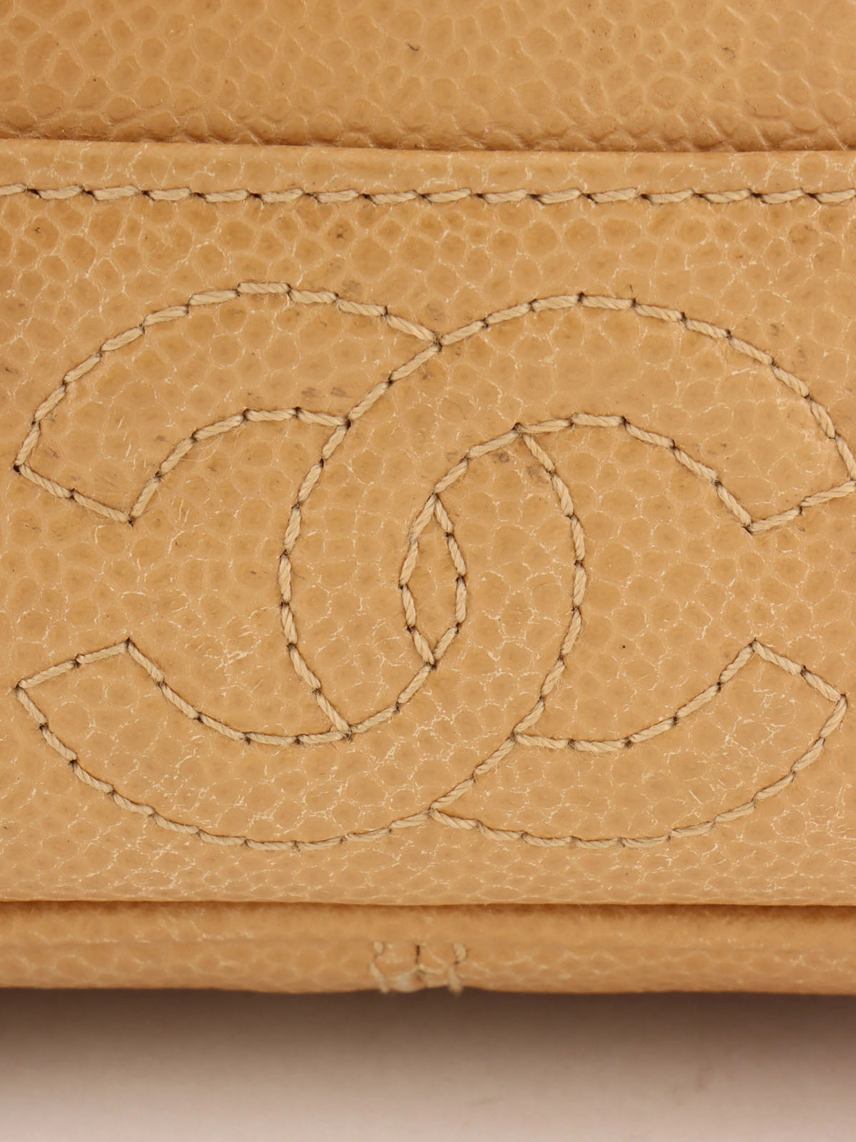 1995 Caviar Skin CC 旋锁背包,米色