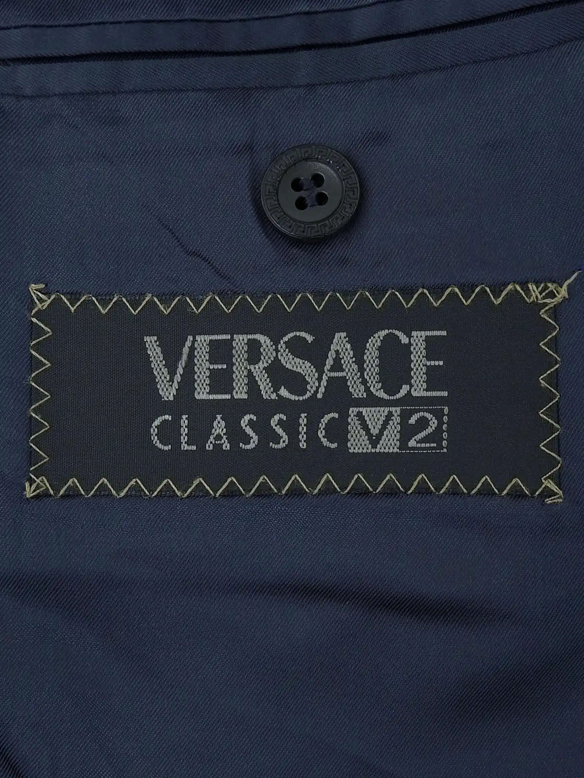 海军蓝格纹徽标纽扣夹克