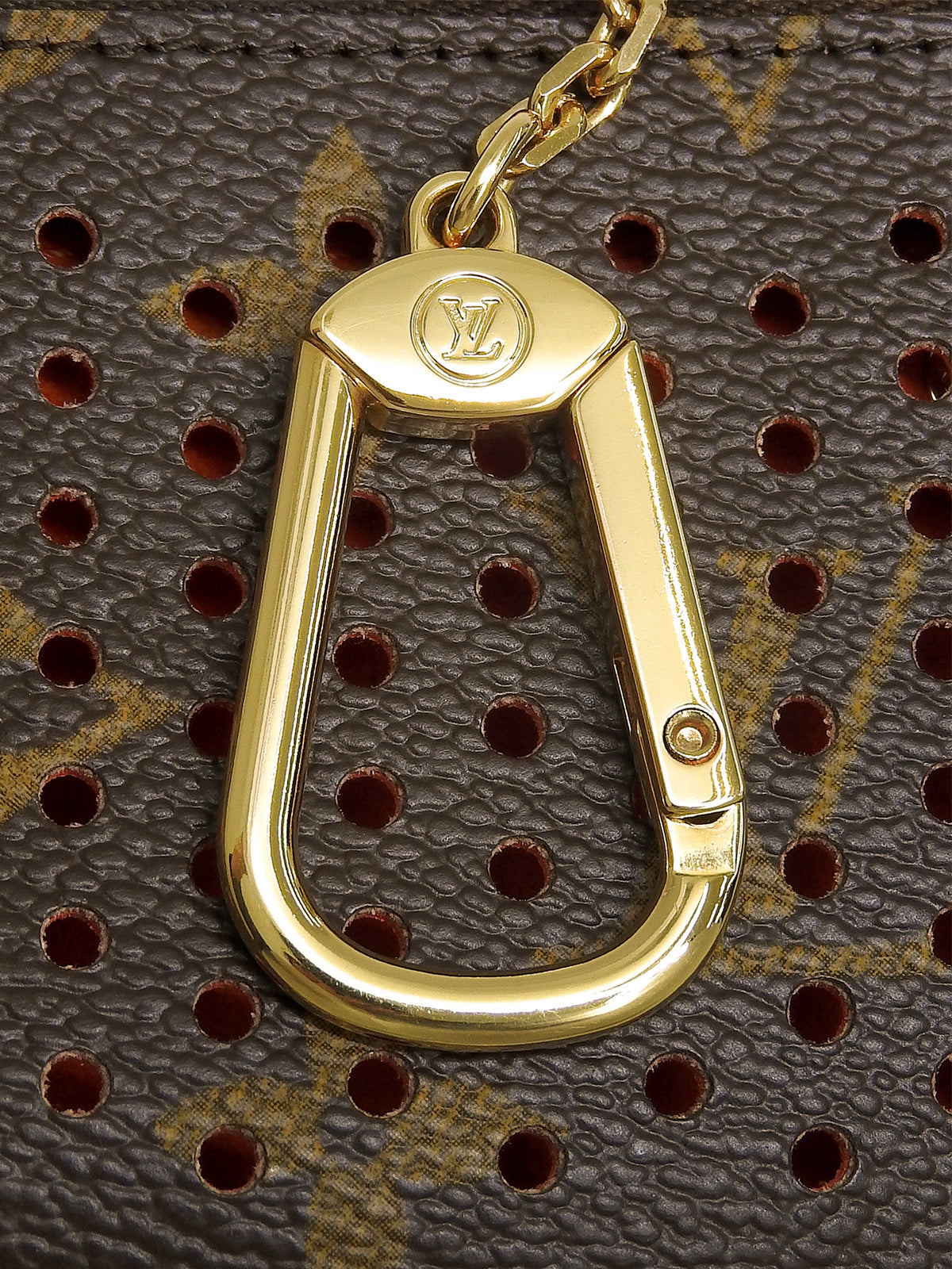 2008 Canvas Monogram Perfo Pochette Cle Brown/Orange