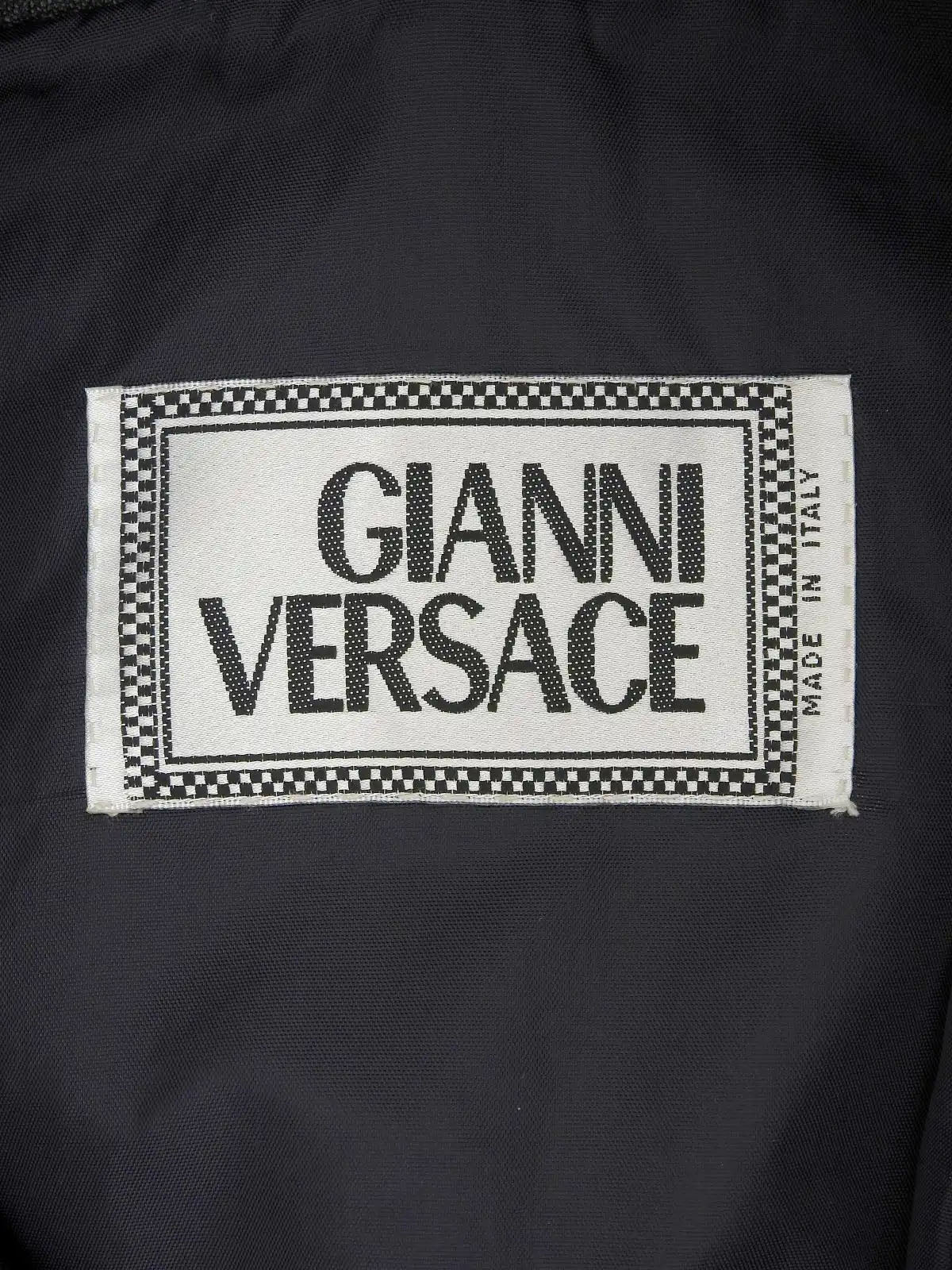 黑色美杜莎纽扣腰带夹克