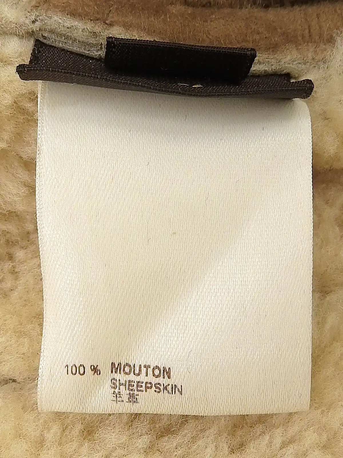 Logo Plate Mouton Jacket in Beige