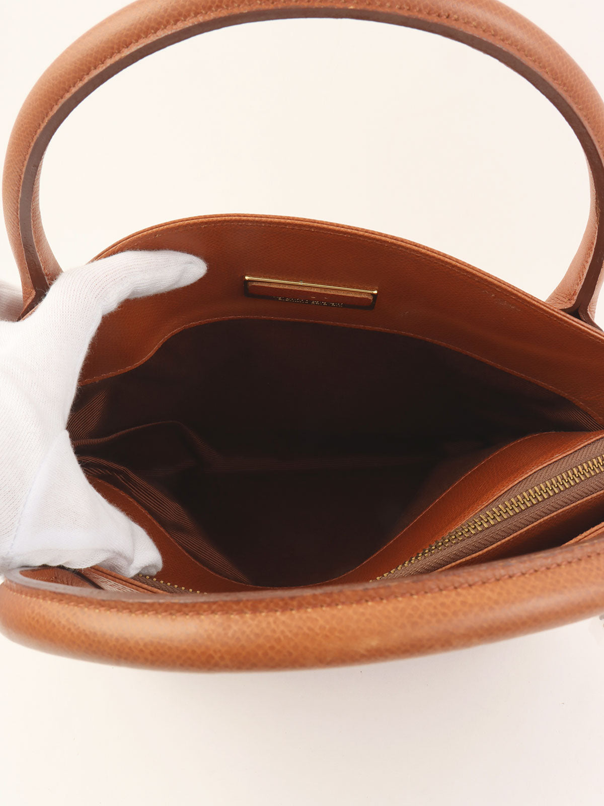 Brown leather tassel handbag