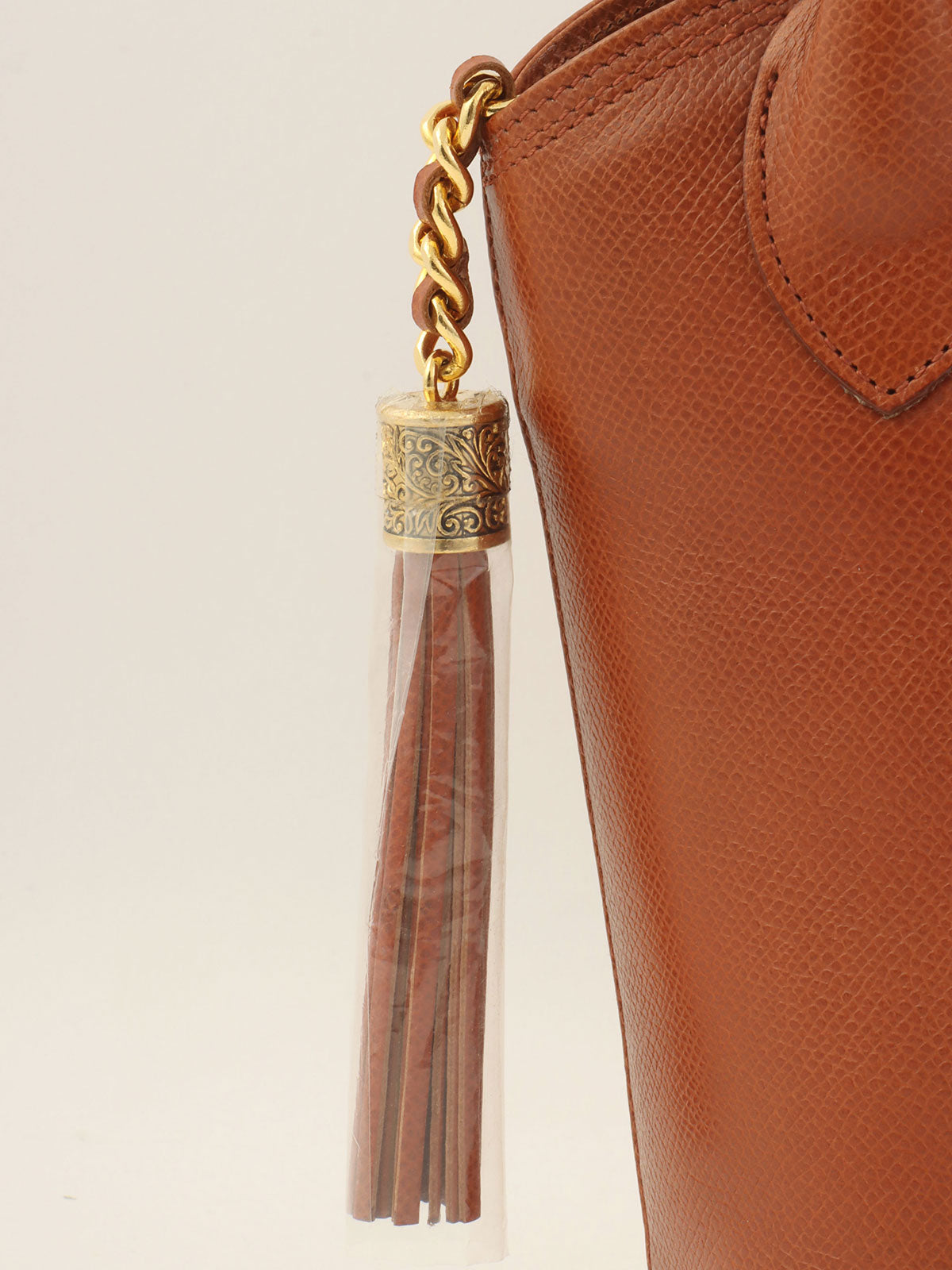 Brown leather tassel handbag