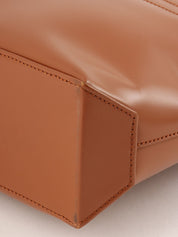 Brown logo embossed handbag
