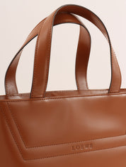 Brown logo embossed handbag