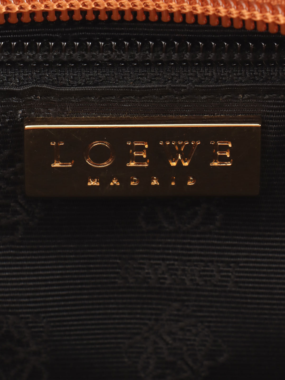 Brown logo embossed handbag