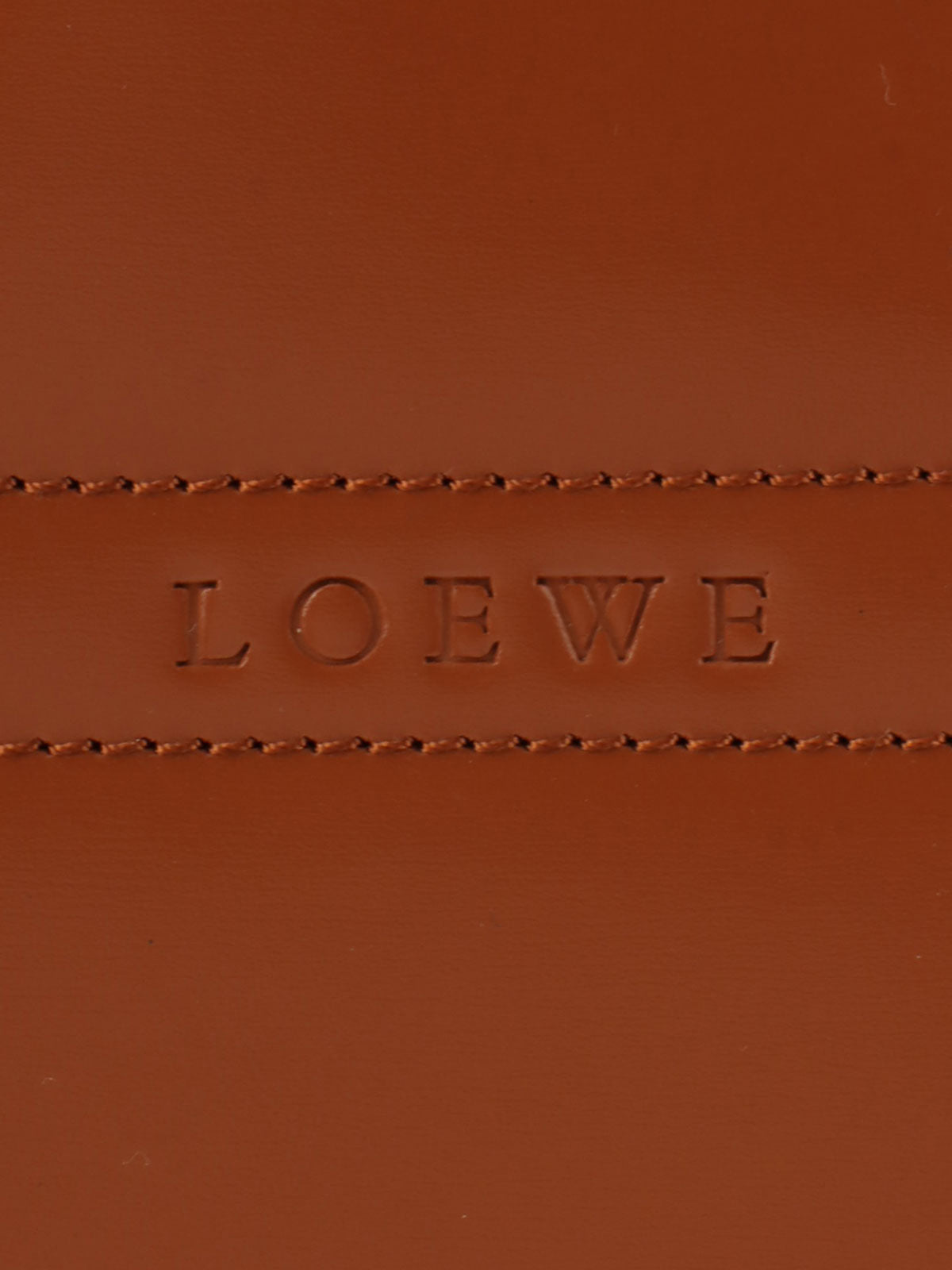 Brown logo embossed handbag