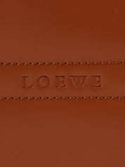 Brown logo embossed handbag