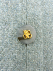 Wool logo button set-up in light blue