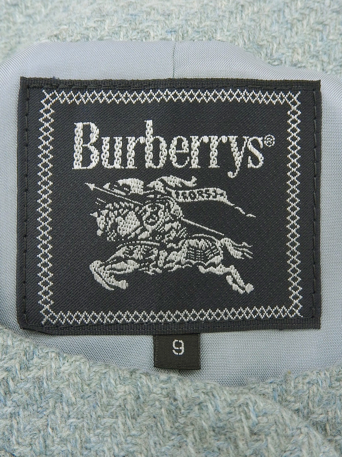 Wool logo button set-up in light blue