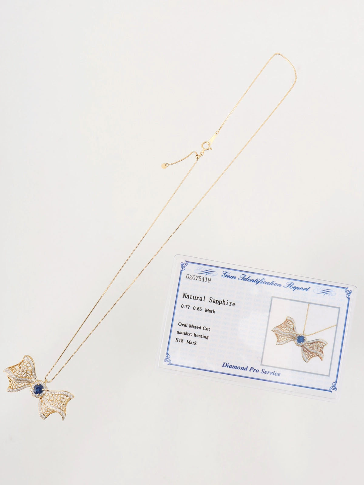 18K Sapphire and Diamond Ribbon Motif Necklace in Blue/Gold