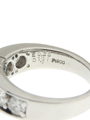 Platinum emerald and diamond ring in silver/green