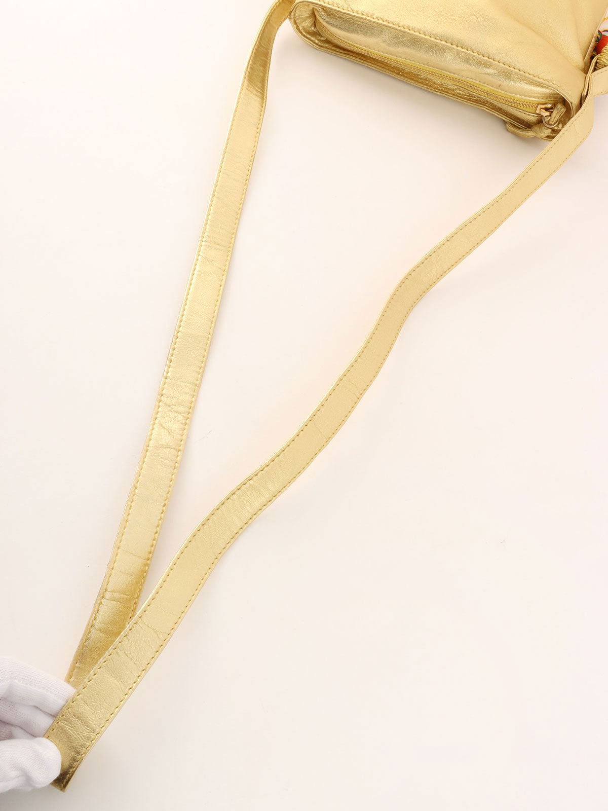 Anagram Embossed Tassel Shoulder Bag  Gold