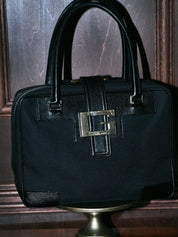 Canvas and leather combination G logo plate handbag in black