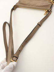 Anagram Embossed Shoulder Bag Metallic Grey