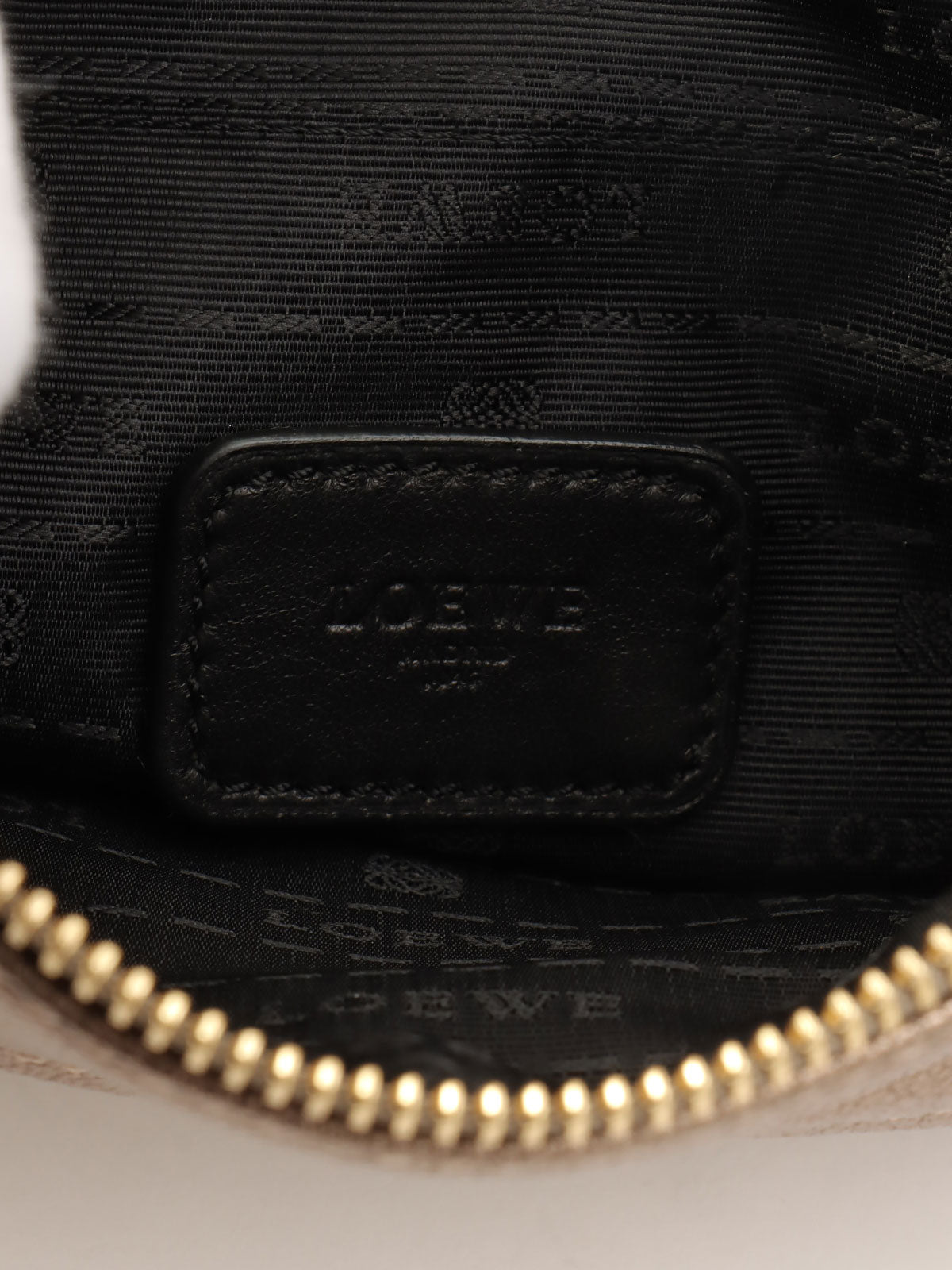 Anagram Embossed Shoulder Bag Metallic Grey