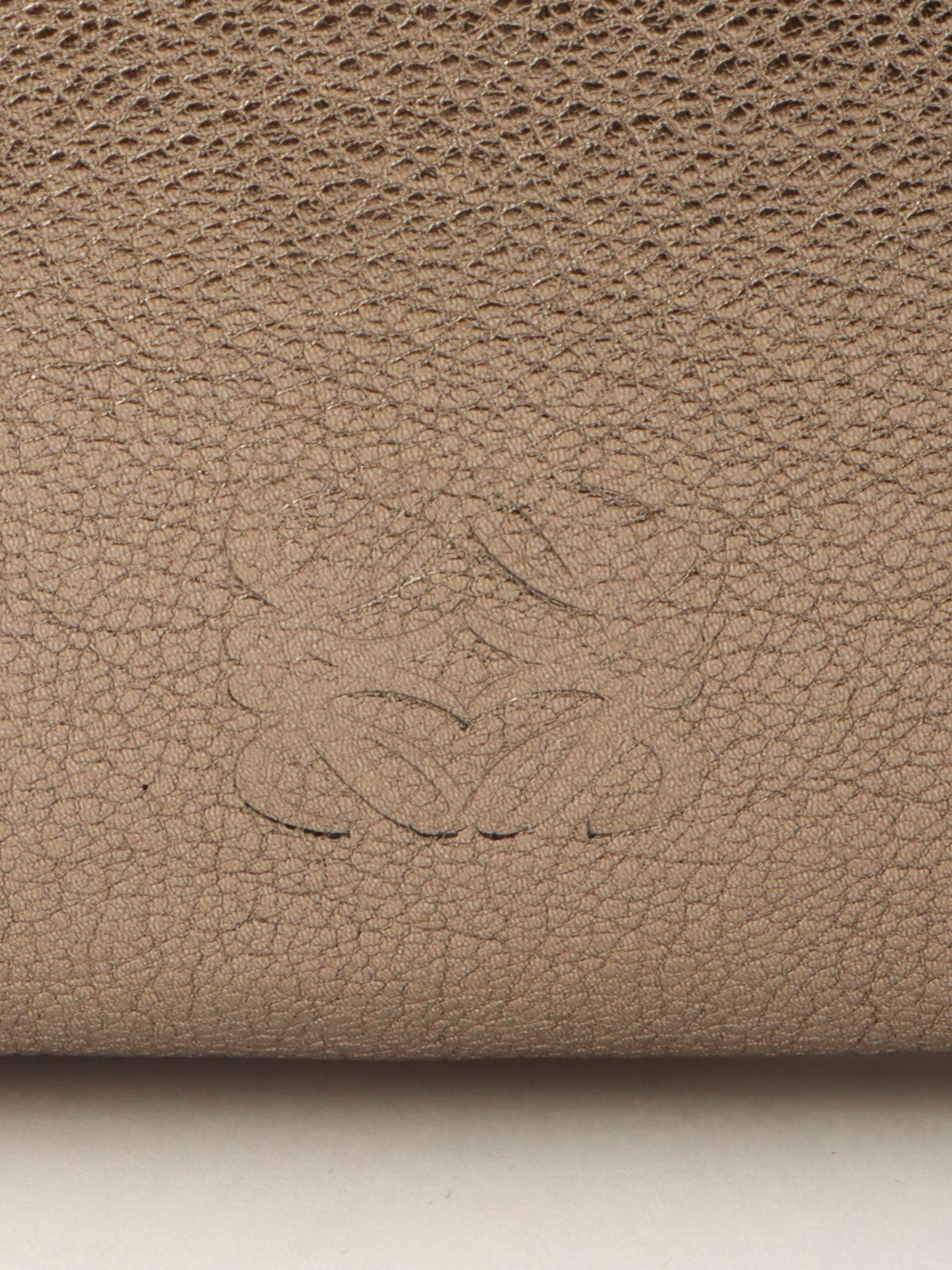 Anagram Embossed Shoulder Bag Metallic Grey