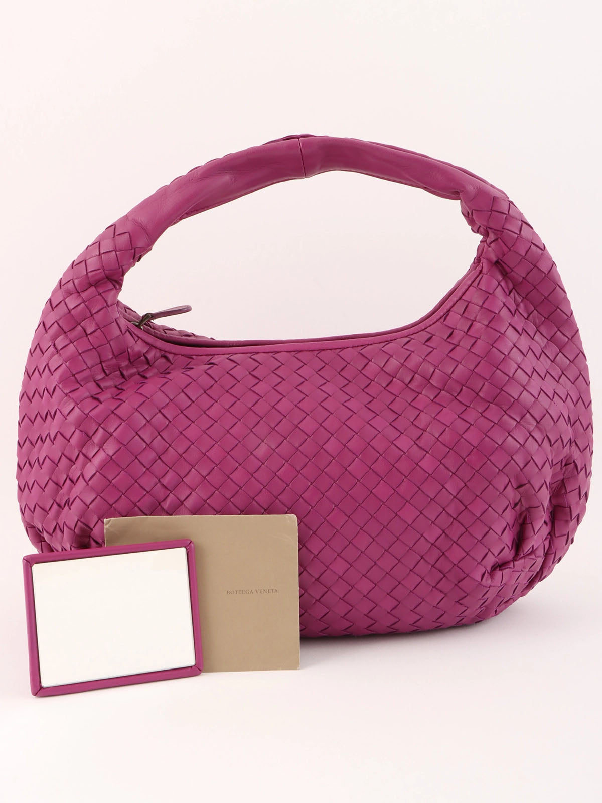 紫色编织单肩包