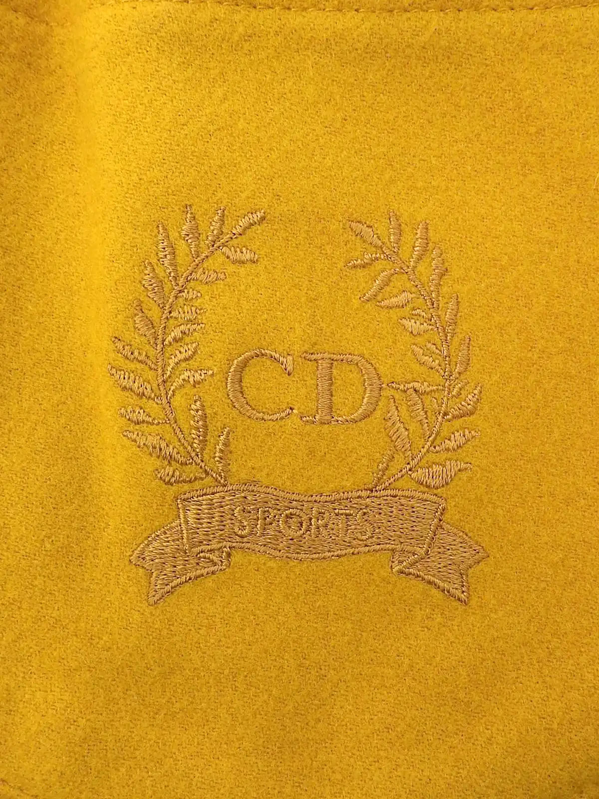 ウールロゴ刺繍Aラインスカート　マスタード
