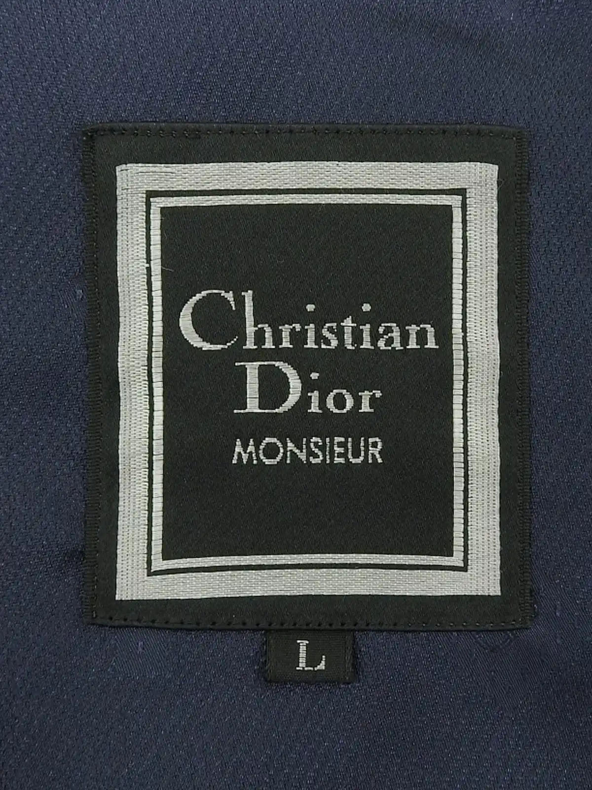 Navy wool jacket with embroidered logo emblem