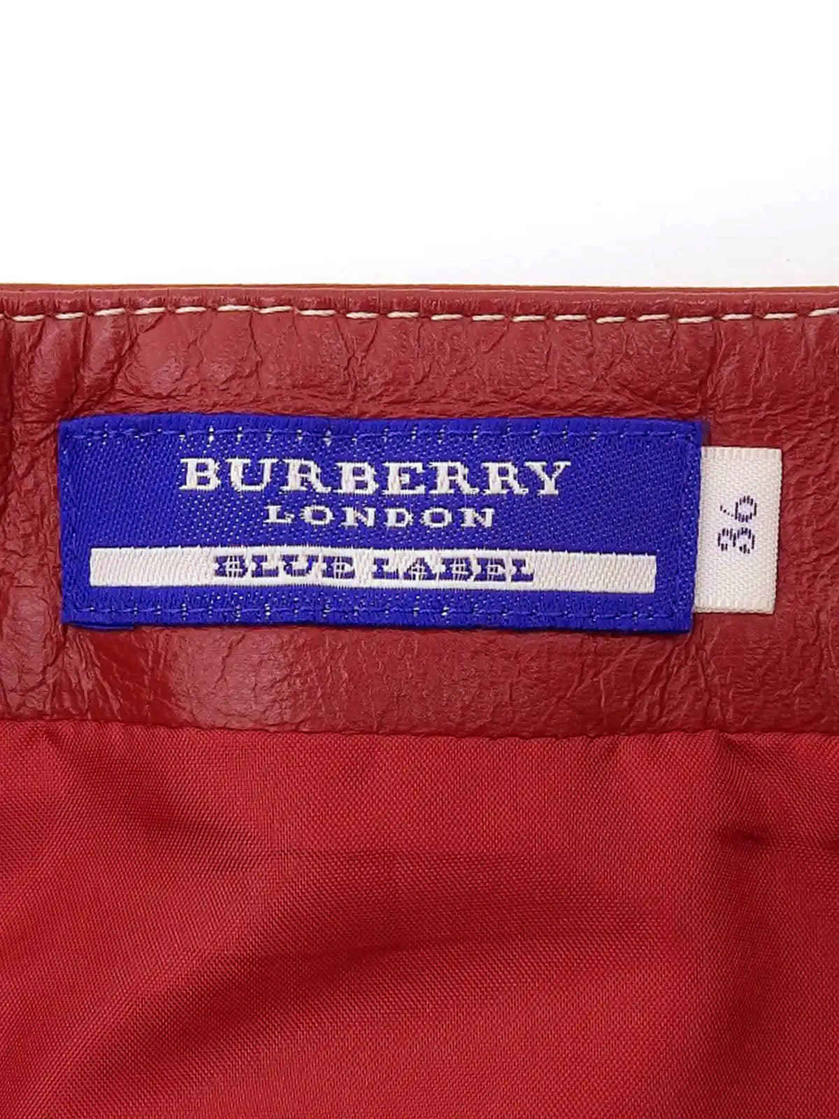 Leather logo plate mini skirt in burgundy