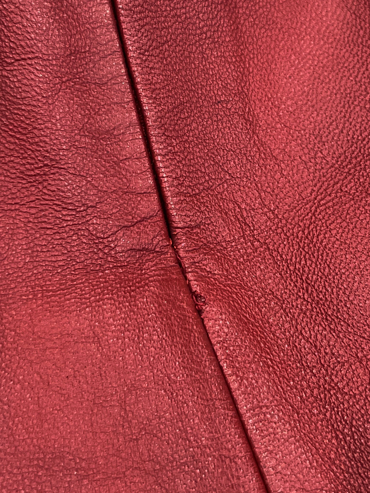 Leather logo plate mini skirt in burgundy