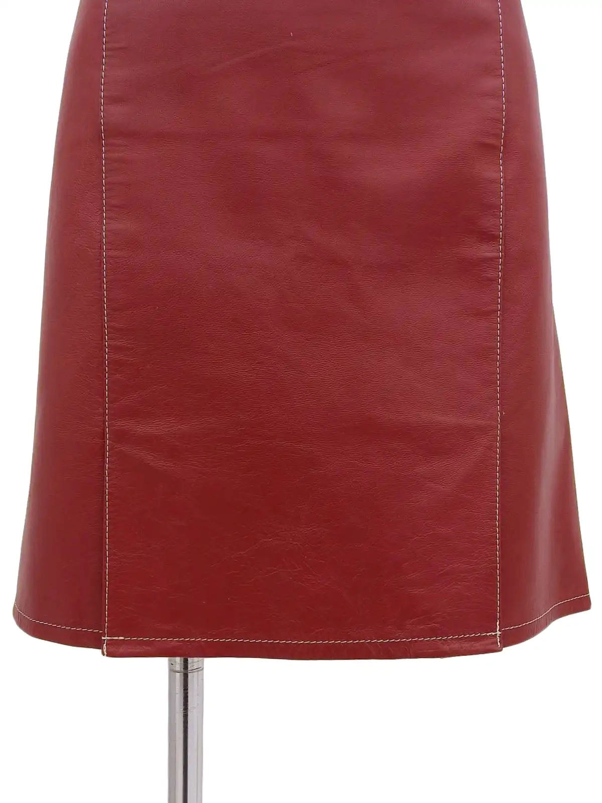Leather logo plate mini skirt in burgundy