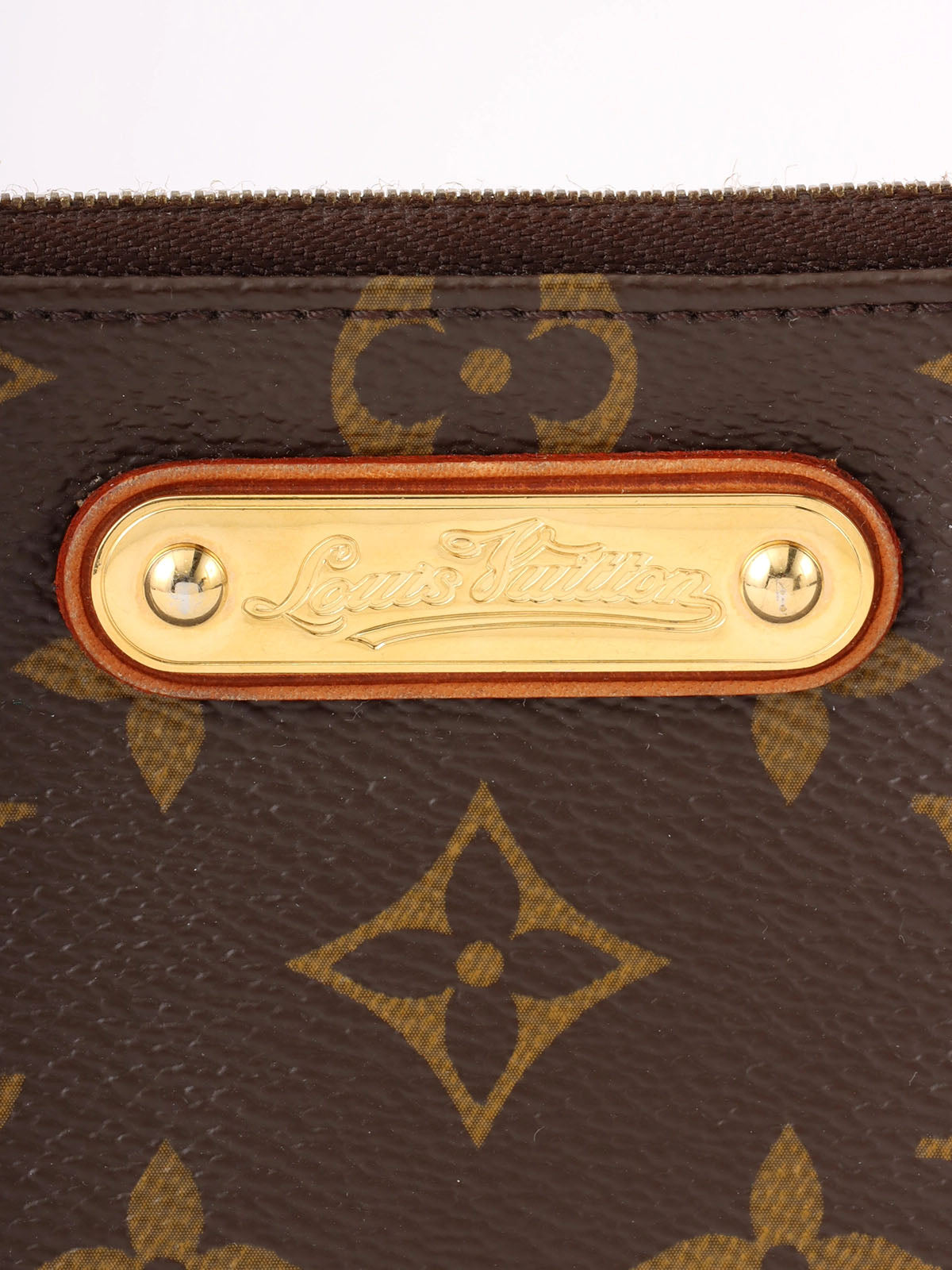 2008 Canvas Monogram Pochette Mira PM Brown