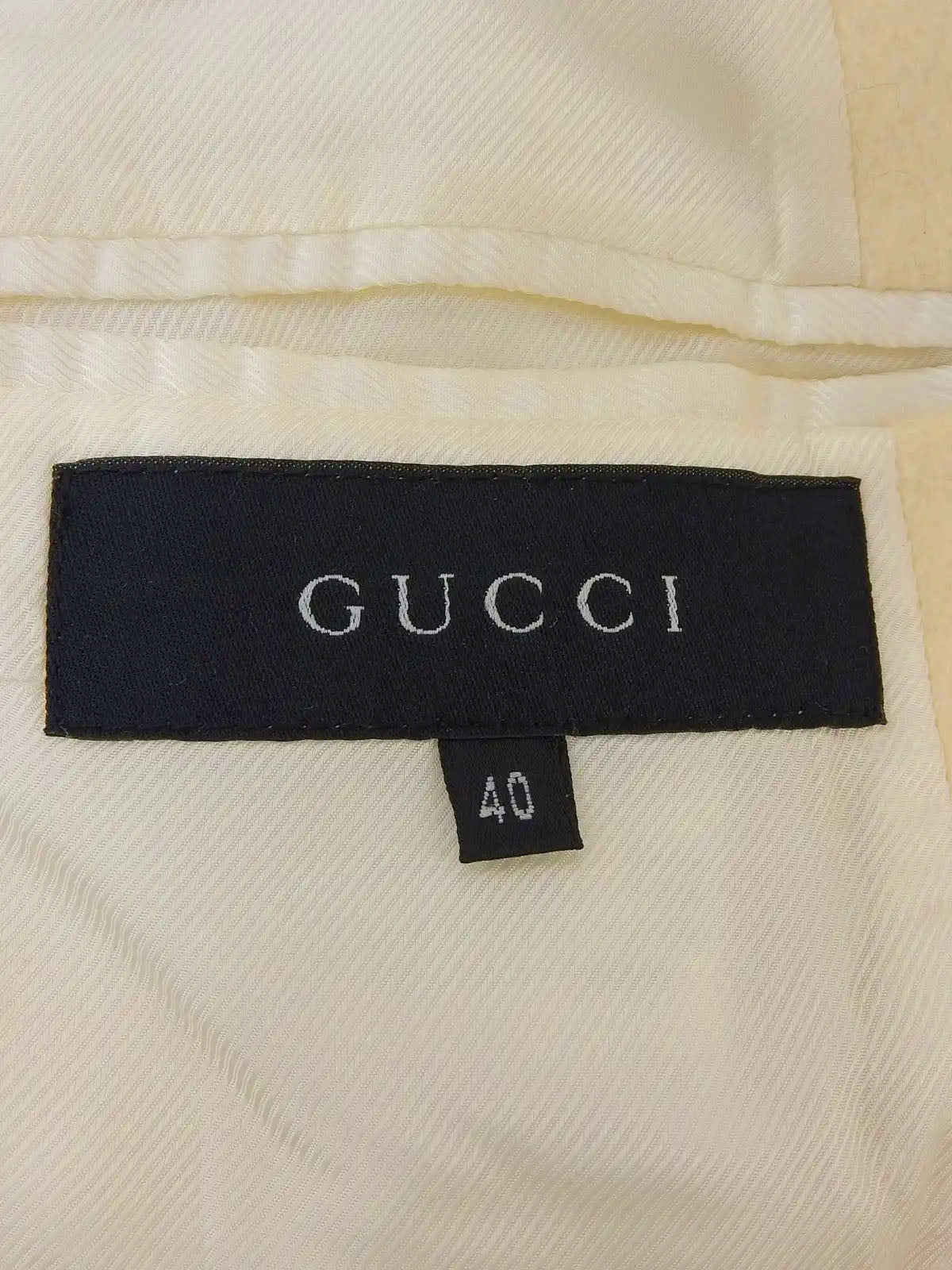 Wool and leather combination logo button long coat in ivory/black