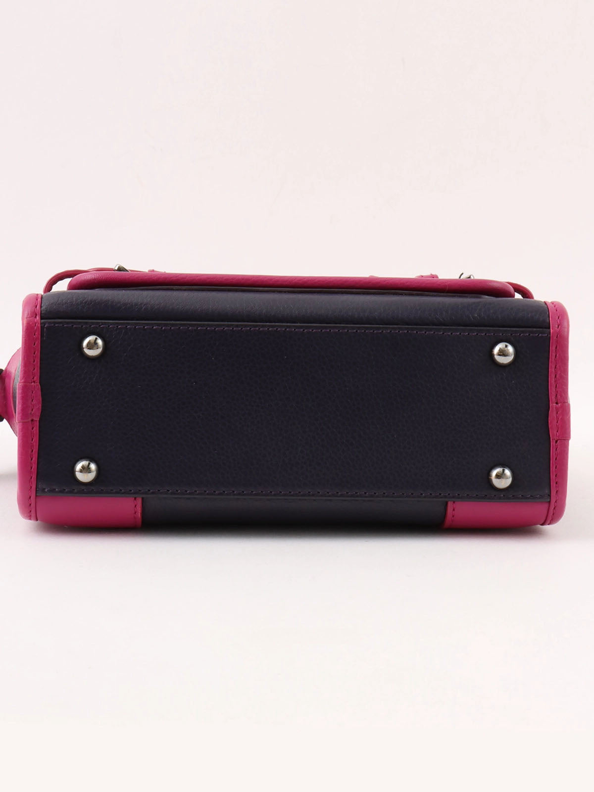 Anagram Cruz 2-way bag in dark purple and fuchsia pink