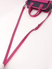 Anagram Cruz 2-way bag in dark purple and fuchsia pink