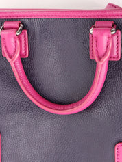 Anagram Cruz 2-way bag in dark purple and fuchsia pink
