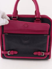 Anagram Cruz 2-way bag in dark purple and fuchsia pink