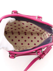 Anagram Cruz 2-way bag in dark purple and fuchsia pink