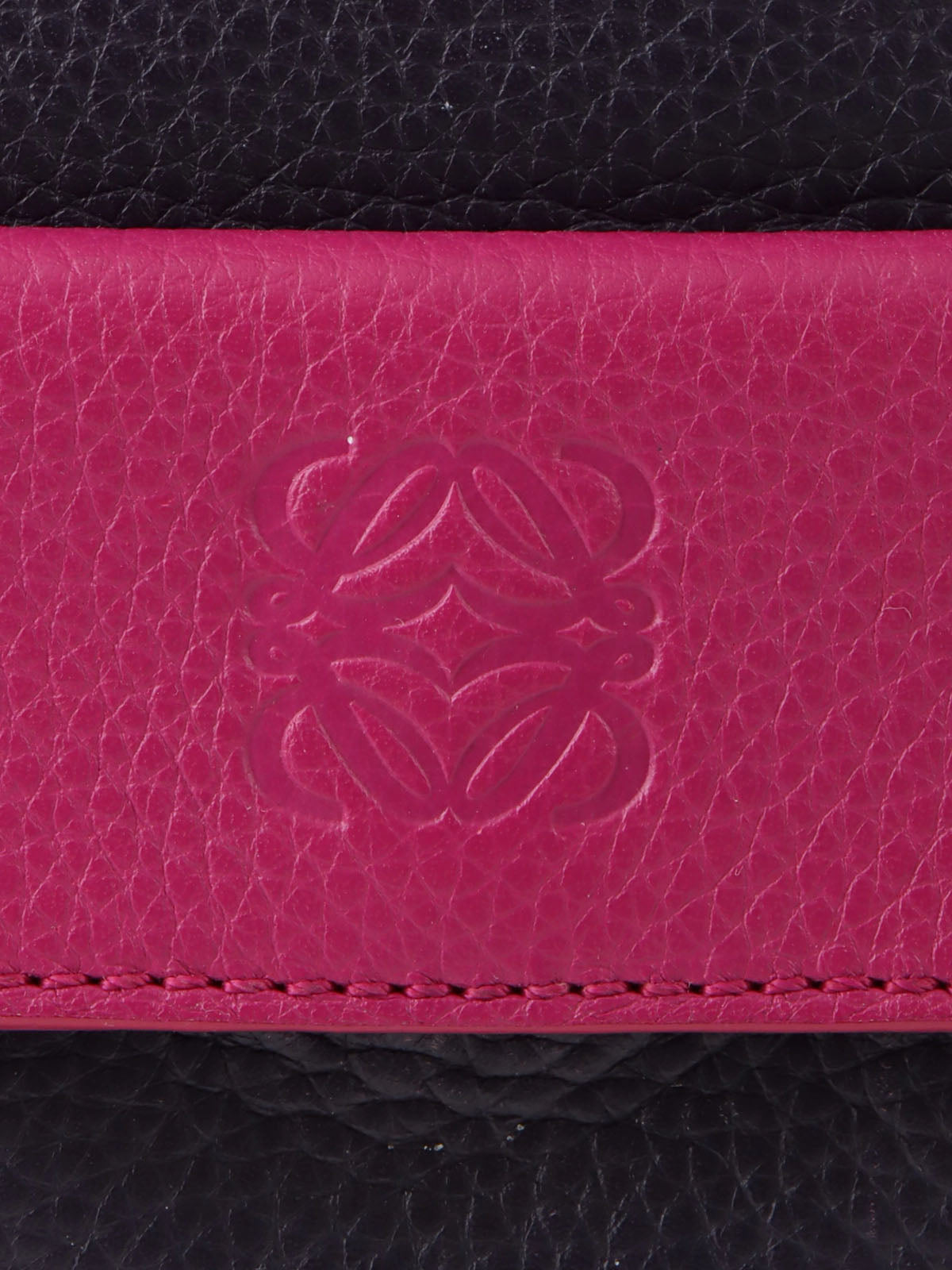 Anagram Cruz 2-way bag in dark purple and fuchsia pink