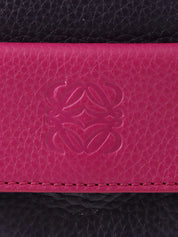 Anagram Cruz 2-way bag in dark purple and fuchsia pink