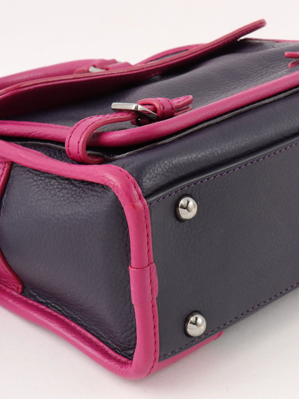 Anagram Cruz 2-way bag in dark purple and fuchsia pink
