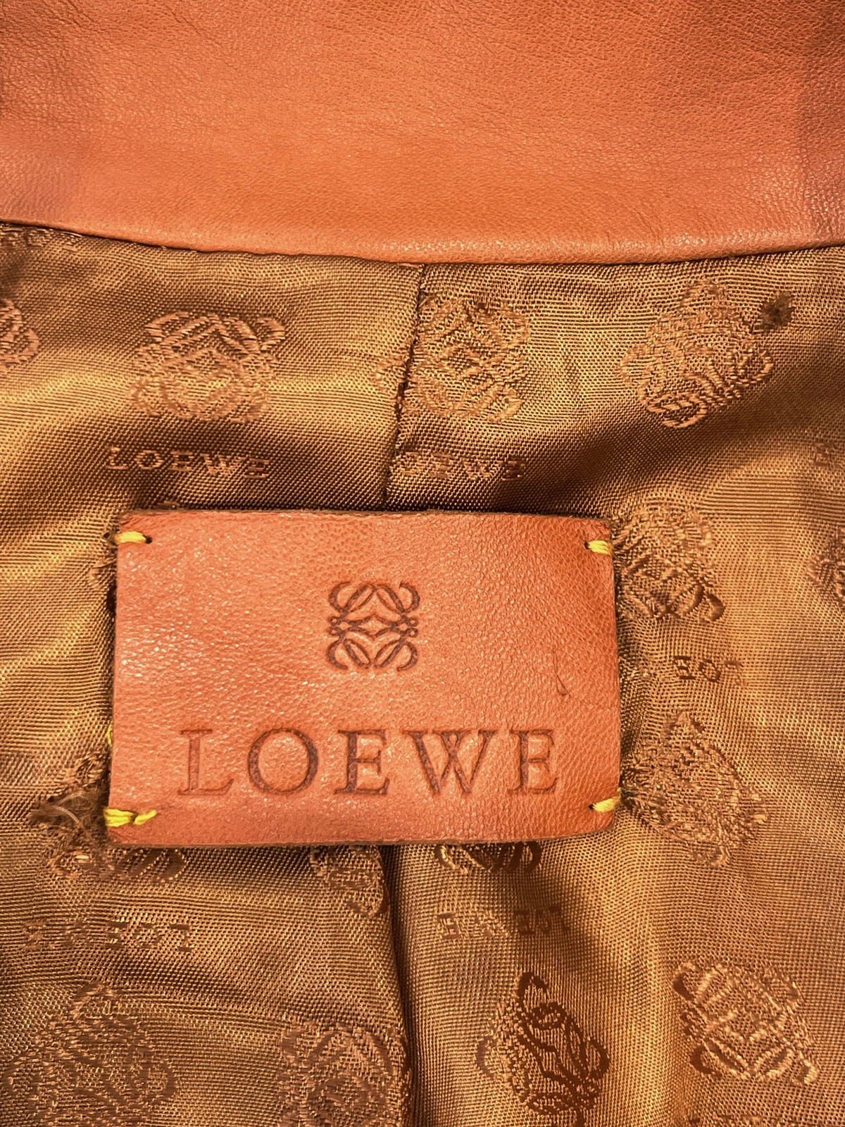 Orange logo button leather jacket