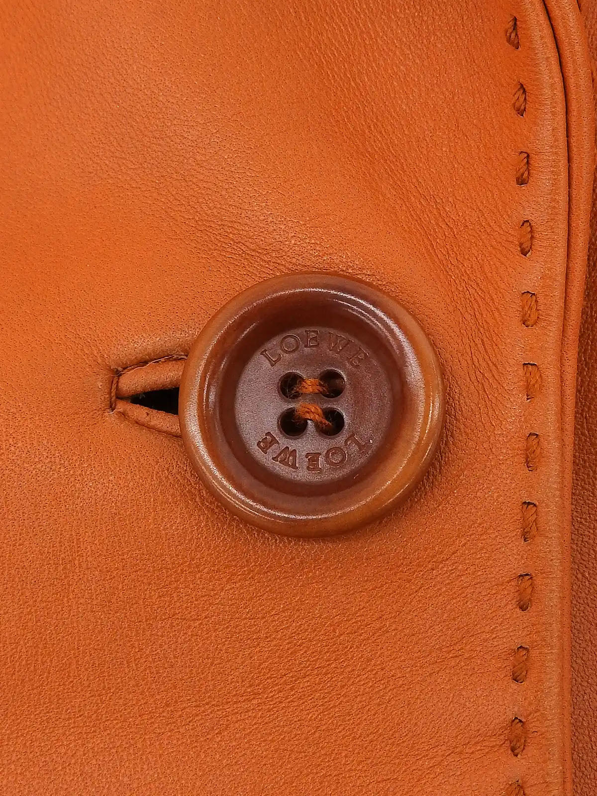Orange logo button leather jacket