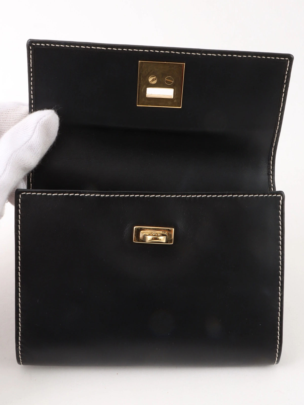 Gancini Plate Waist Bag in Black