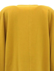 Wool collarless long coat in mustard yellow