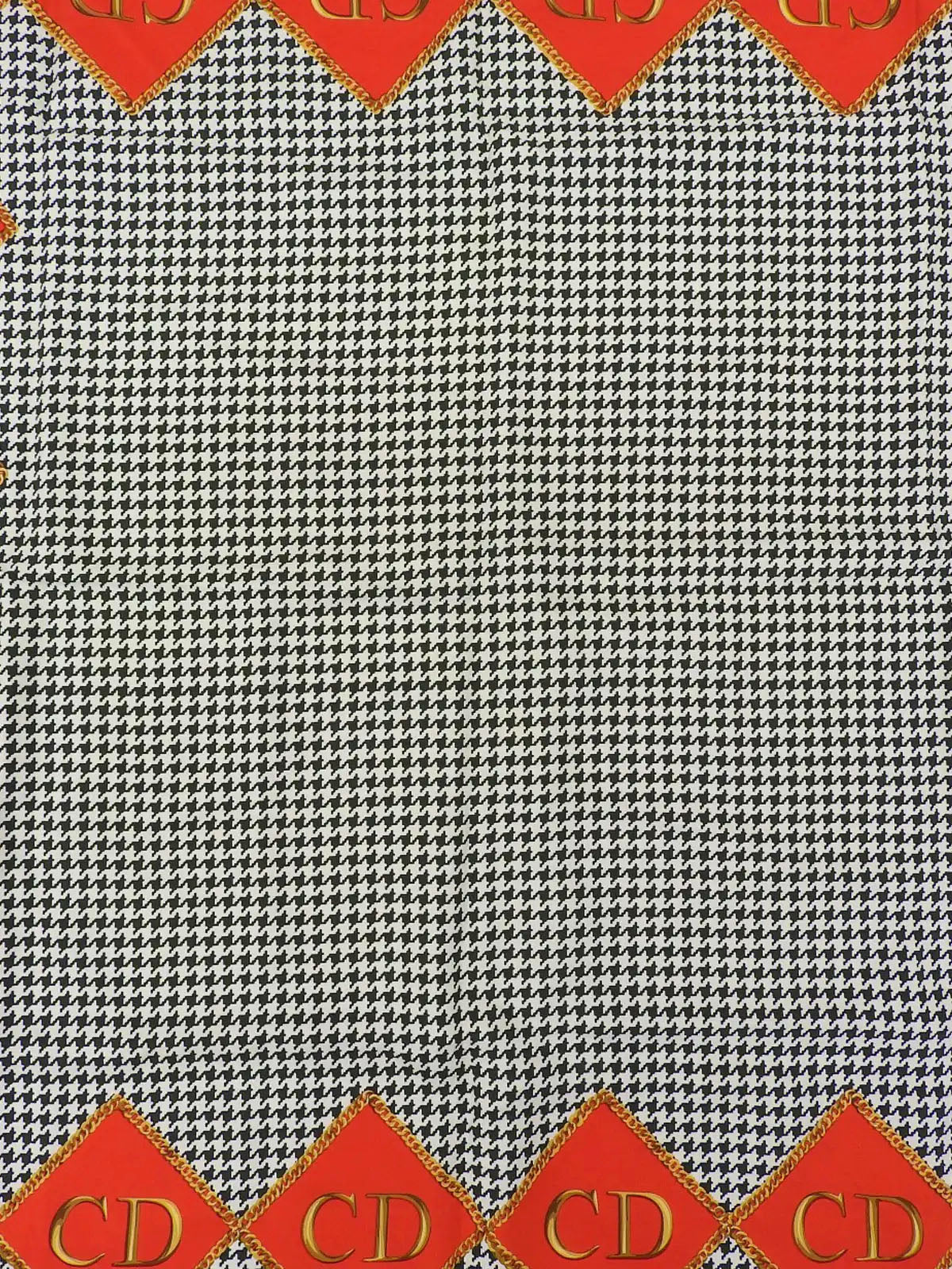 Houndstooth logo pattern scarf in red, white, and black