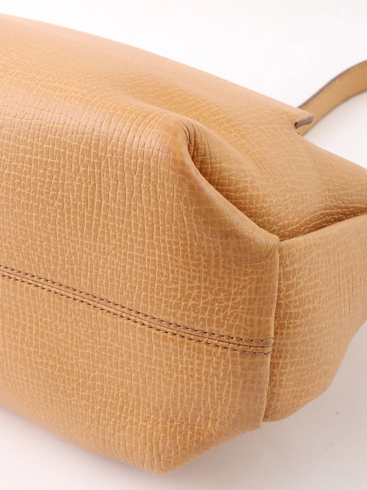 Logo embossed shoulder bag in beige