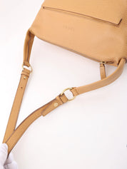 Logo embossed shoulder bag in beige